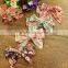 Pom pom baby linen romper floral pattern M7041201
