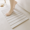 Plain Foldable Absorbent Quick Drying Roll Up Diatomite Bath Mat Manufacturer