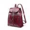 All purpose style bags leisure backpack, close by hook and tassel/fringe, nice burgundy color