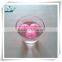 pink round water floating candle