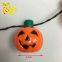 Колесо огней на Halloween с фонариками из тыквы, светящееся в темноте