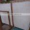 White travertine tile and slab