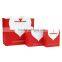 Hand gift paper bag /made with glossy lamination 210gsm ivory paper bag