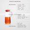 Clear 1000ml glass water juice pot with plastic lid and handle