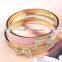 China wholesale gold plated jewelry zinc alloy rhinestone bowknot bangle for girls