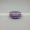 Round cosmetic pressed powder compact