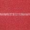 Machine tufted loop pile wall to wall carpet