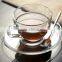 glass tea cup and saucer