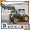 Farm tractor with front loader and backhoe loader