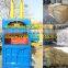 hydraulic wheat straw baling machine/rice straw vertical hydraulic baler/hydraulic baling machine price