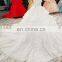 LS10386 white off the shoulder peplum wedding dress with long chapel train dubai wedding dress