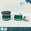 Green coloured cosmetic glass bottle and cosmetic glass jar