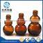 Unique shaped Amber essential oil glass bottles                        
                                                                                Supplier's Choice