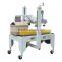 Adhesive Tape Automatic Flaps Folding Carton Sealer/Flaps Folding Carton Sealing Machine                        
                                                Quality Choice