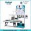 peanut bagger with sewing machine and conveyor