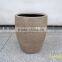 Fiberstone tapered vase with color sand spray on it