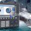 Low cost CNC lathe machine with spindle motor
