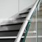 Helical Stairs with Stone Treads arc double spine steel staircase glass balustrade