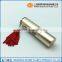 Delicate fringed metal lipstick tube