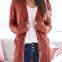 Women's solid color twist button cardigan sweater