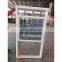 American style vertical sliding window with mosquito netting
