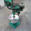 Machine for fine grinding round beads of colored gemstones