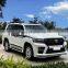Runde ПП-материал для Toyota Land Cruiser (старый вариант, модернизированный до нового) черного стиля комплект кузова (передний и задний бампер, боковые юбки, решетка радиатора, фары)