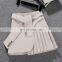 TWOTWINSTYLE A Line Skirt For Women High Waist Irregular Hem Patchwork Pleated Mini Fashion Autumn
