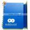 notebook with sticky notes and pen