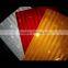 Fluorescent yellow/fluorescent orange reflective prismatic sheet