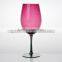 color red wine glass with silver stem and base