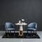 Люкс-уphолstered dining chair with a modern fabric cushion and a wooden leg frame