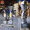 Procesador de alimentos para frutos secos. Máquina industrial de mantequilla de cacahuete. Peque?a máquina industrial de mantequilla de cacahuete.