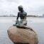 Famous bronze mermaid sculpture by the sea