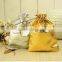 IN STOCK metallic silver fabric pouch with a drawstring cord
