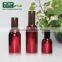 Red Amber shape PP cosmetic bottles with screw airless pump dispenser