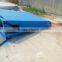 Hydraulic stationary hydraulic container loading dock ramp lift