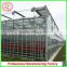 China price multi-span glass greenhouse with drip irrigation for sale