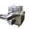 Chocolate enrober with granular decorating sprinkler grain dispenser