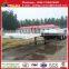 China New 40T 3 Axle Drop Deck Trailer for Container Transport