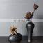 Factory Direct Supply Art Handmade Black White Water Shape Simple Porcelain Ceramic Modern Vase Pot Home Room Decoration