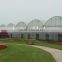 modern plastic film greenhouse with steel skeleton and hot drip galvanized bolt for vegetable and flower grow for hot sale