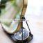 Popular black gold design standing desktop make up mirror jewelry storage mirror with metal stent