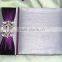 Luxurious & glamorous silver silk gate fold foilo wedding invitations with a small flap & purple ribbon & brooches                        
                                                Quality Choice