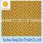Yellow fabric and black mesh weft knitted colored fabric for clothing