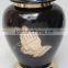 Brass Praying Hand Cremation urns.