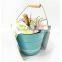 round white oil tin pail with lid