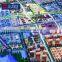 Scale model city handmade digital marketing screens for real estate