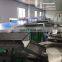 Disc Feeding And Packing Machine for Egg Roll Fully Automatic Pillow Wrapping machine