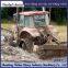Wheel tractor modified with triangular track wheels for anti-skid and anti sinking
